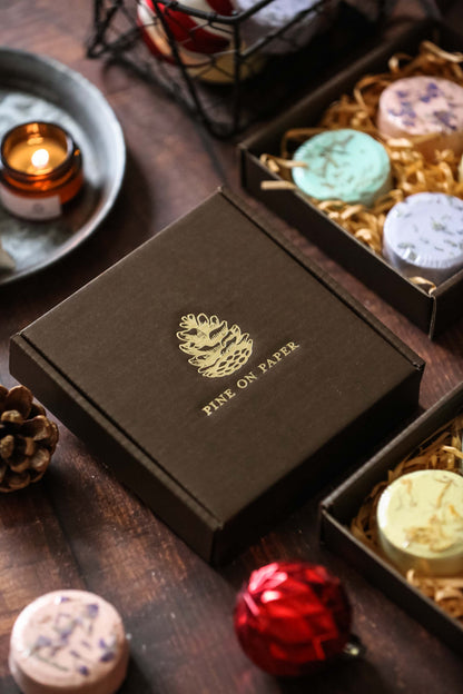 4 aromatic shower steamers delicately packed in an exquisite gift box